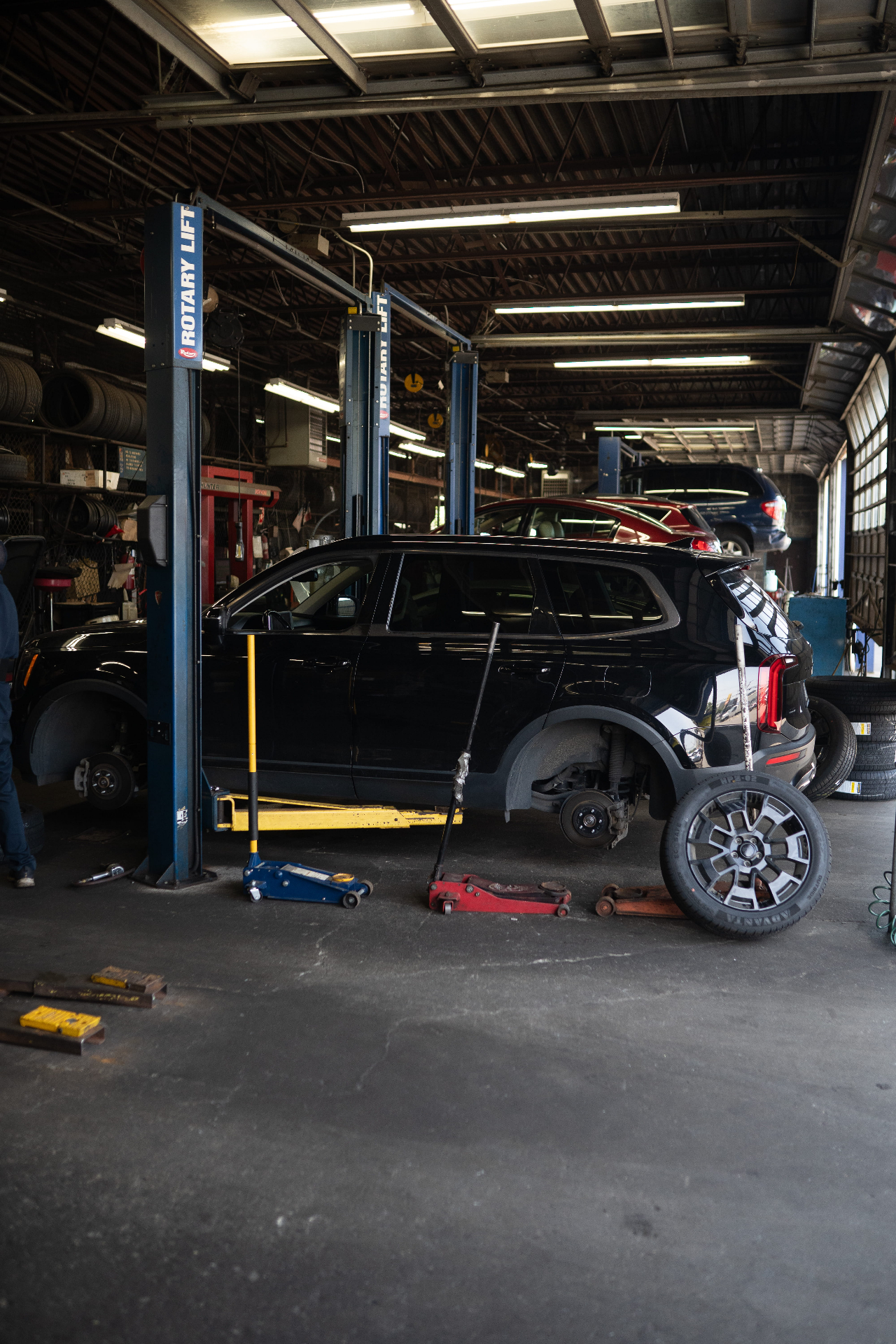 Vehicle on lift for strut replacement Bronx